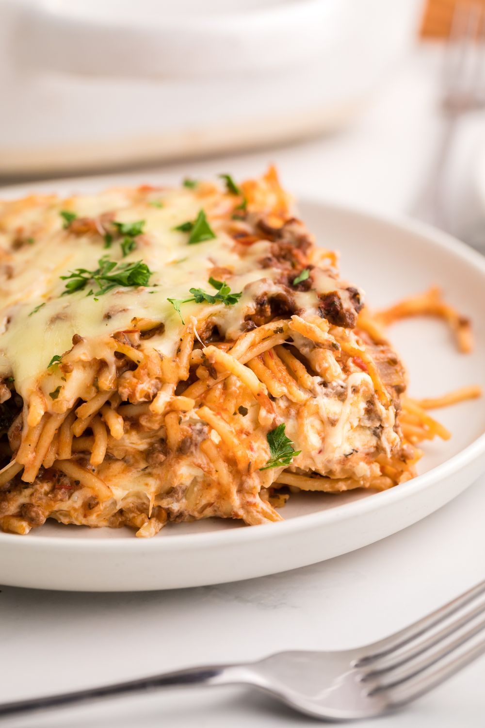 close up of Million Dollar Spaghetti Casserole on plate 