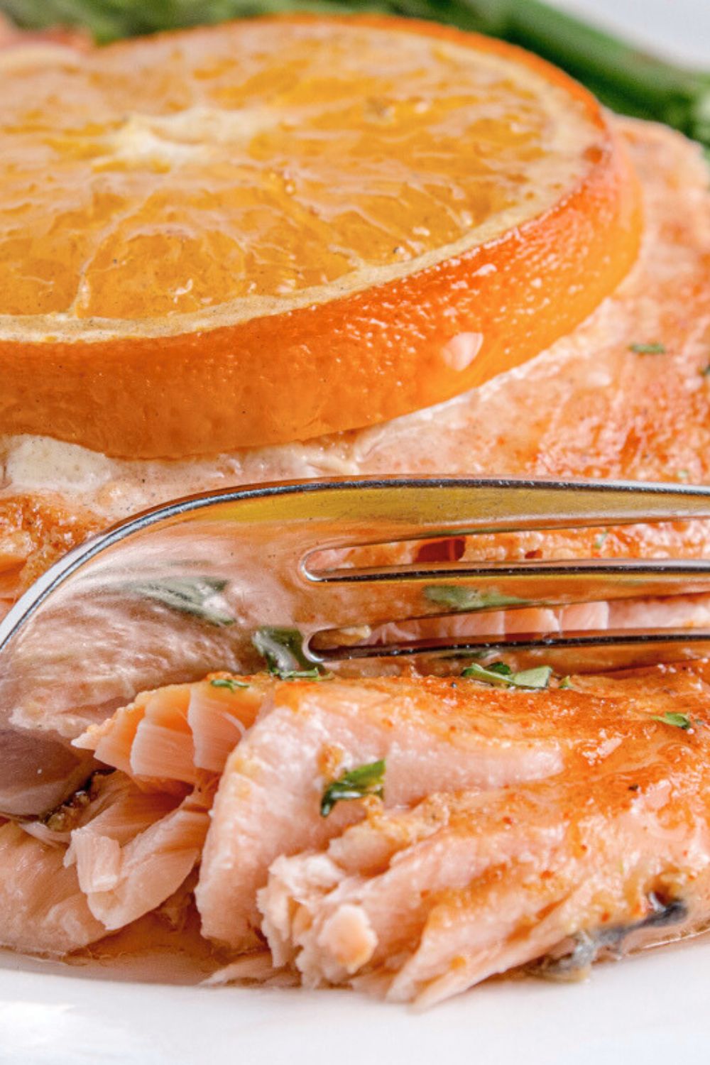 Grilled Honey Mustard Salmon with a fork cutting into the salmon