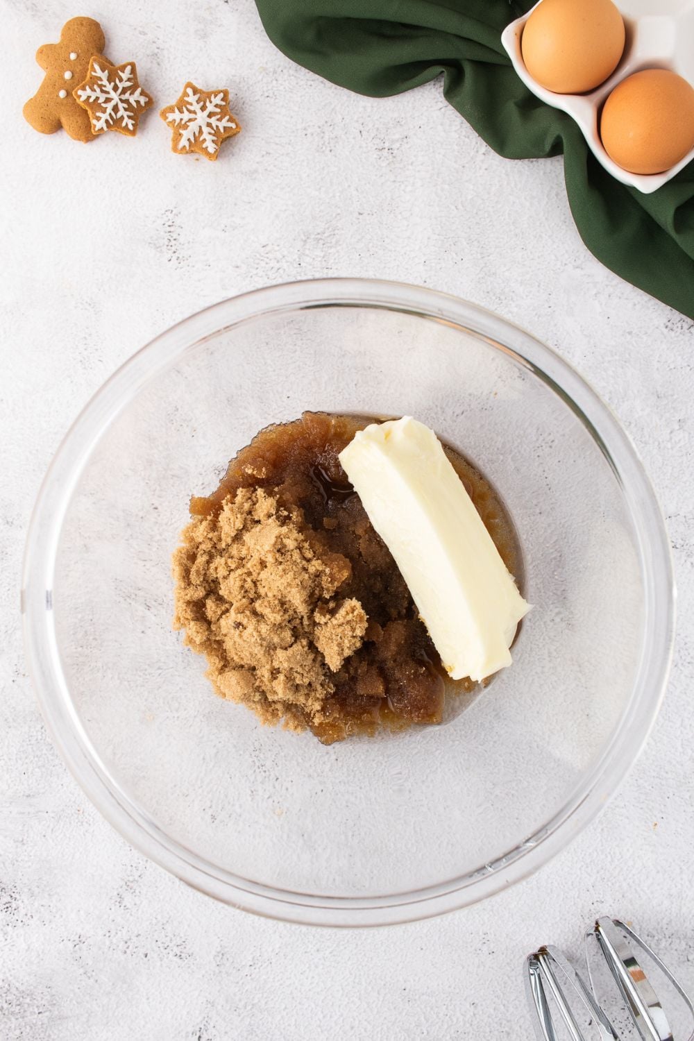 brown sugar and more in a bowl with a stick of butter for making Gingerbread Cake with Cream Cheese Frosting