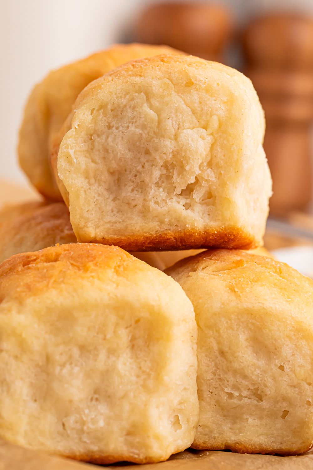 2 Ingredient Dinner Rolls stacked on table to show how fluffy they are 