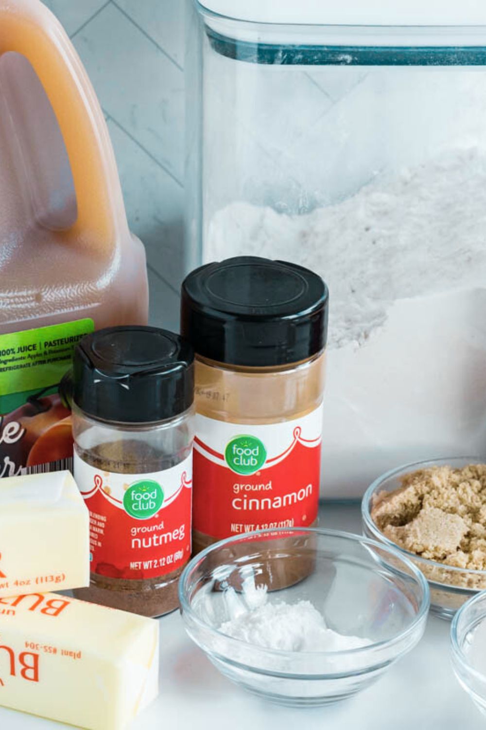 ingredients to make Apple Cider Whoopie Pies on table in single serve containers 