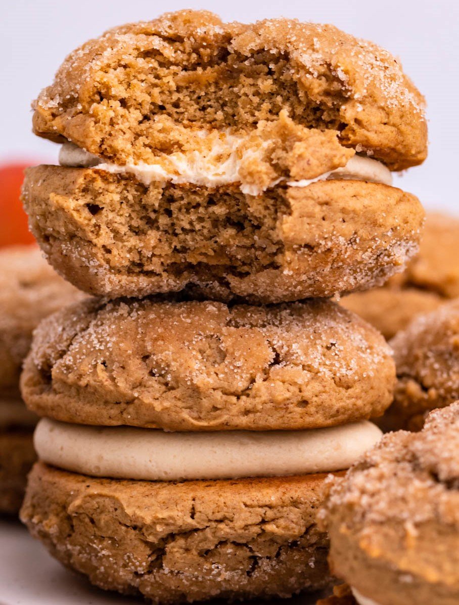 a couple of the Apple Cider Whoopie Pies stacked on on top of each other 