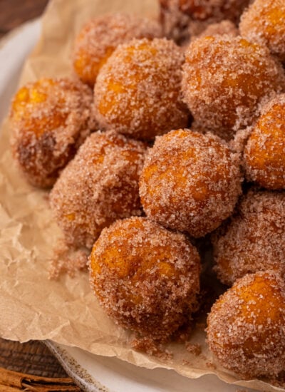 Pile of 2 Ingredient Pumpkin Pie Donut Holes on a serving platter