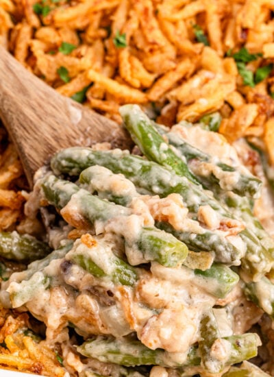 Green Bean Casserole in a white casserole dish sitting on a table