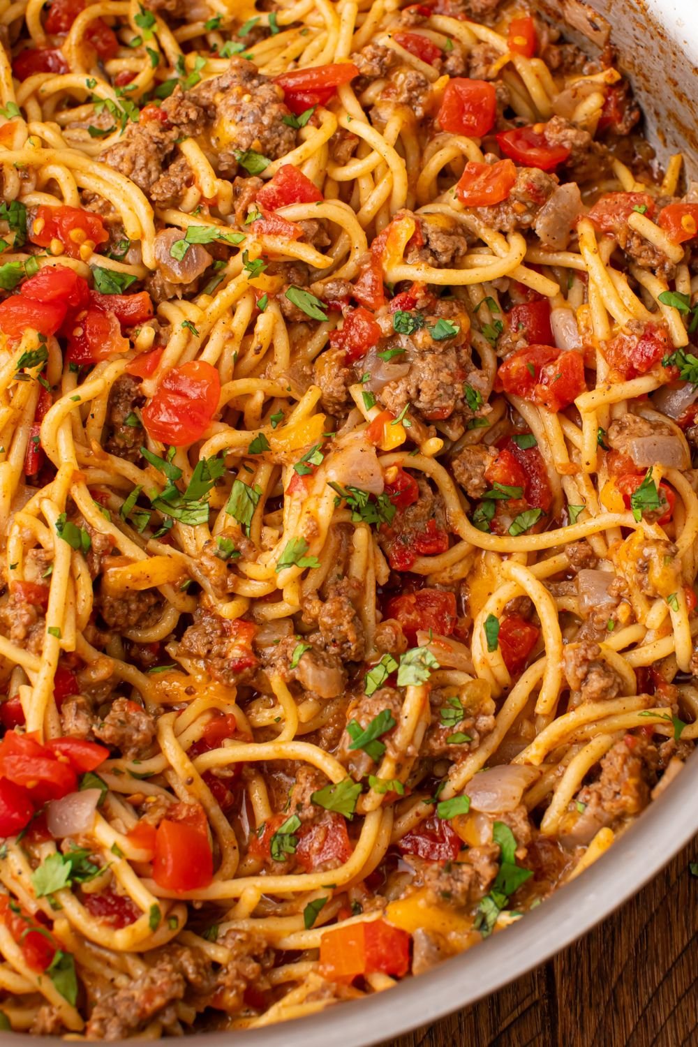 Taco spaghetti with Rotel in a metal pan on table
