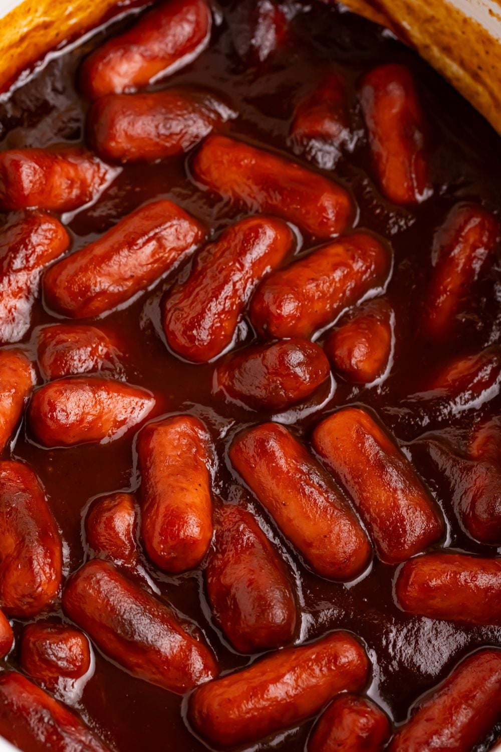 3 ingredient crock pot smokies in a white crockpot