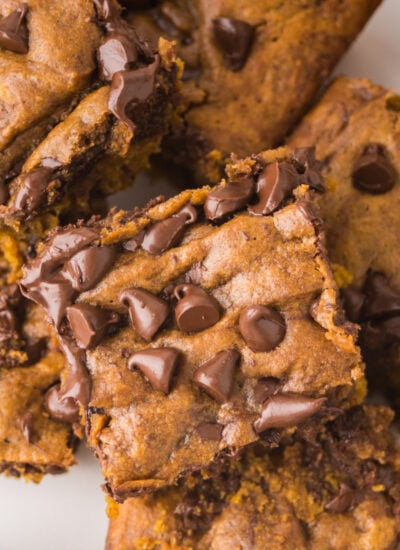Brown Butter Pumpkin Chocolate Chip Bars stacked and sliced