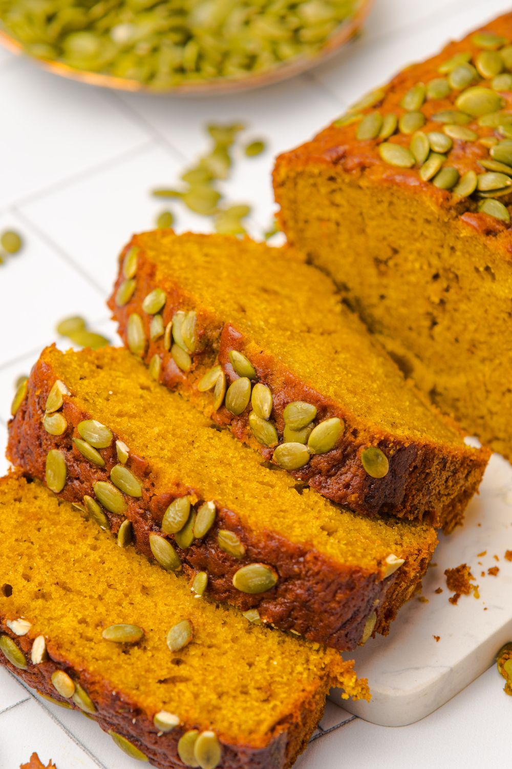 thick slices of Starbucks Pumpkin Bread placed on a white table 