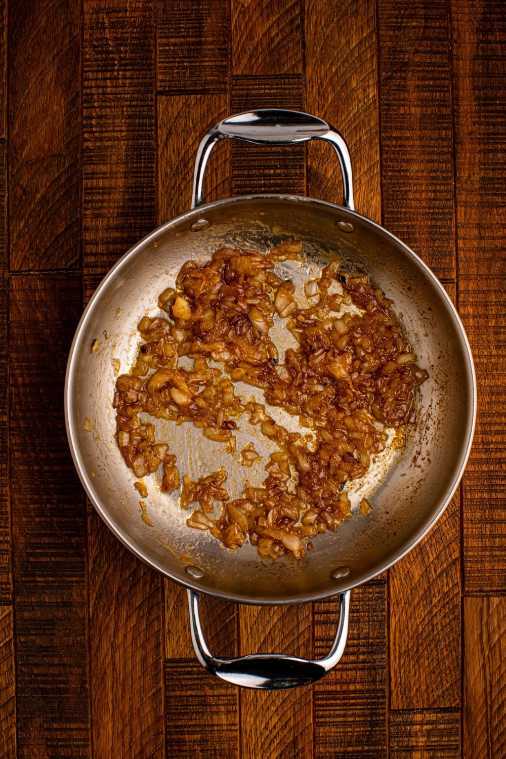 pan of caramelized sitting on wooden table