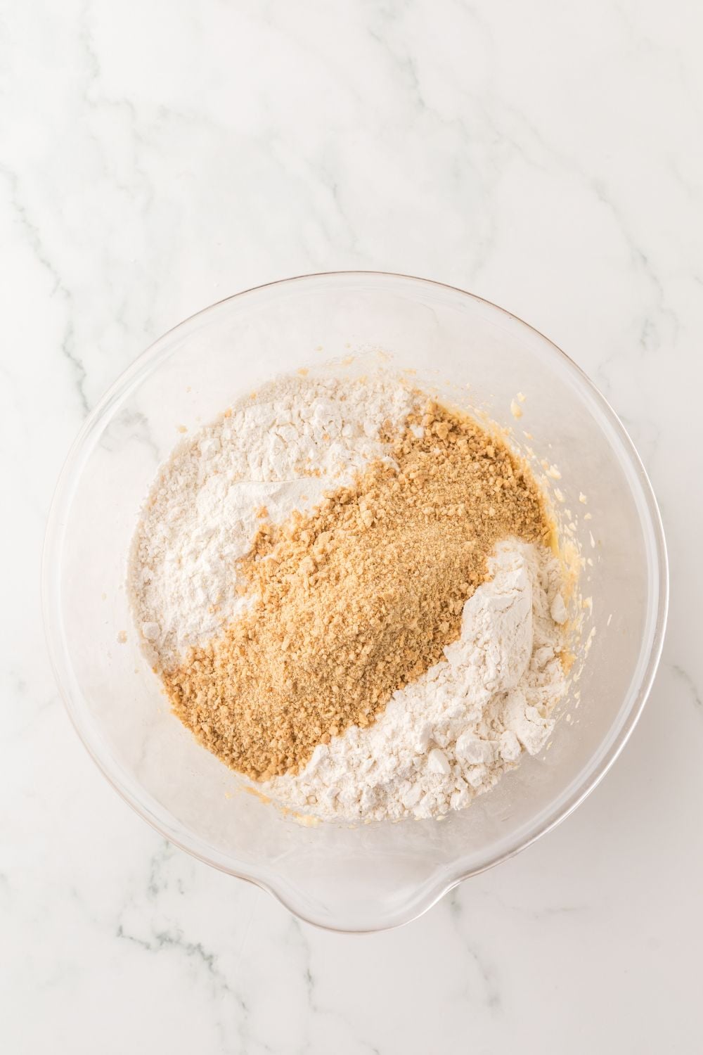 dry ingredients in a glass bowl for making cheesecake cookies