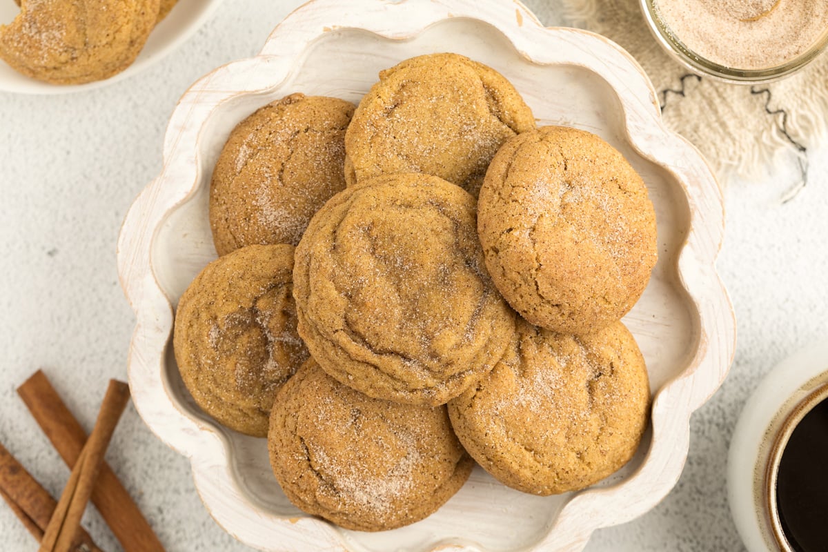 Pumpkin Snickerdoodle Cookies on a white wooden platter 