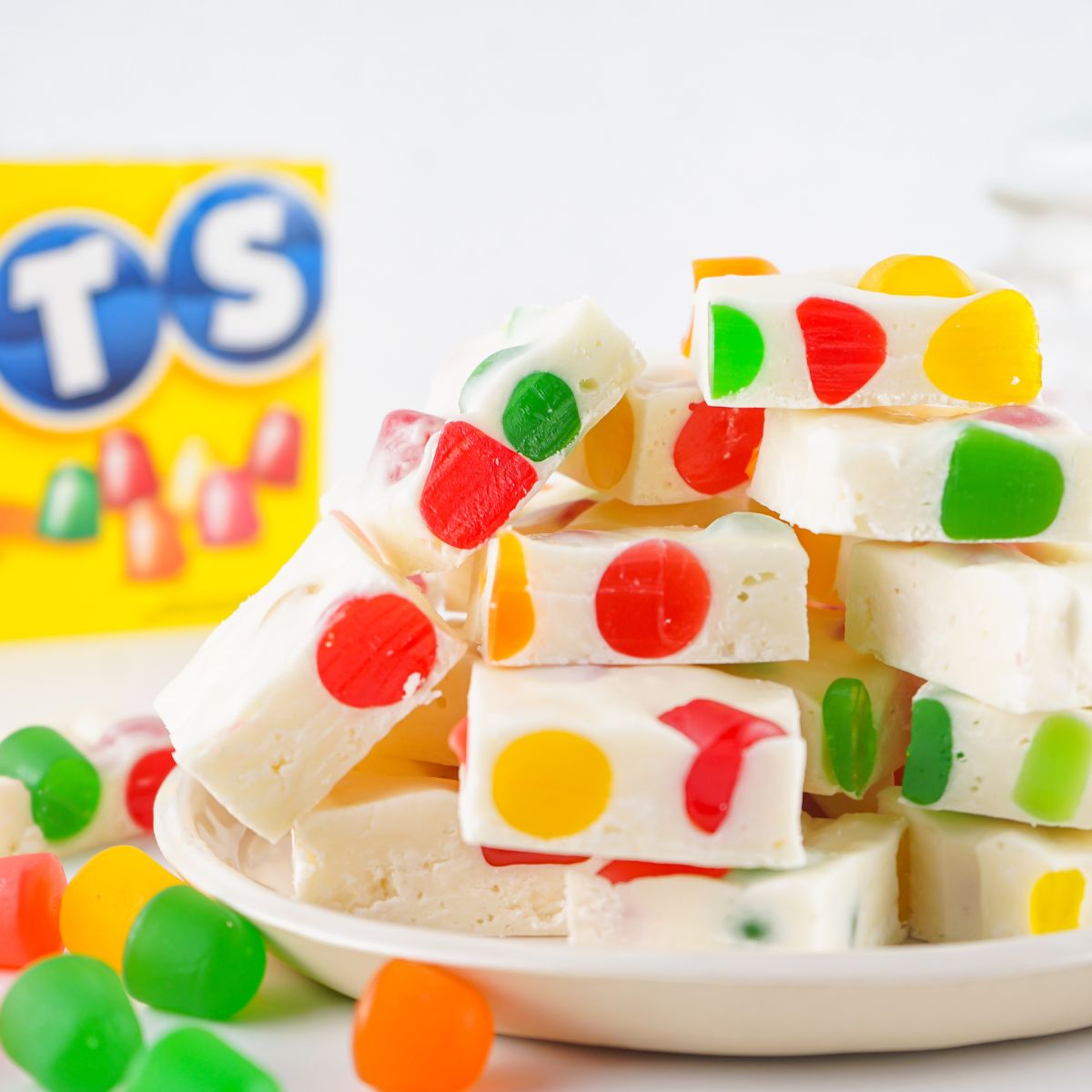 Christmas Gumdrop Nougat Candy on a plate with gumdrops around the table 