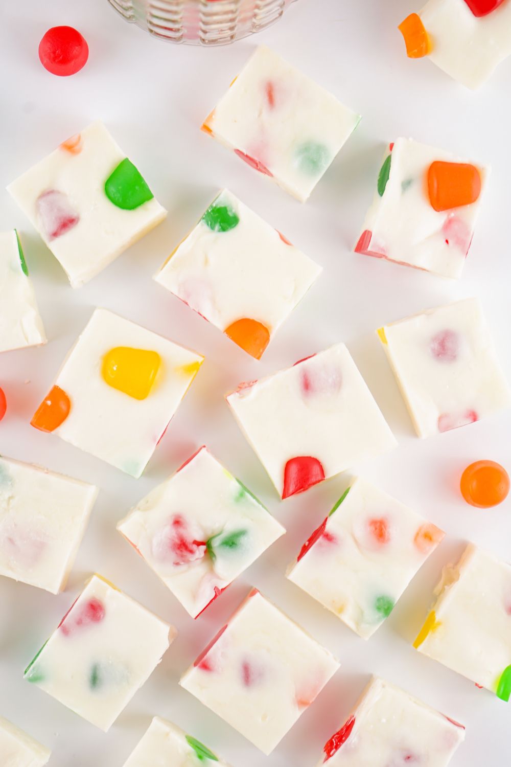Christmas Gumdrop Nougat Candy sliced in cubes on a white table 