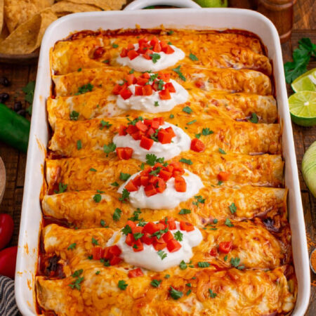 Steak Enchiladas (Cheesy Oven-Baked Mexican Dinner) in a white baking dish