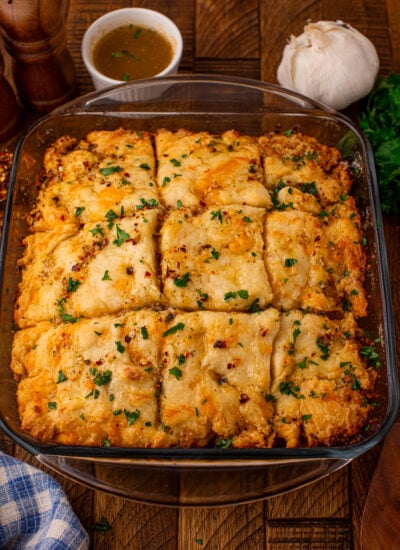 cowboy butter swim biscuits in a glass baking dish