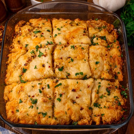 cowboy butter swim biscuits in a glass baking dish