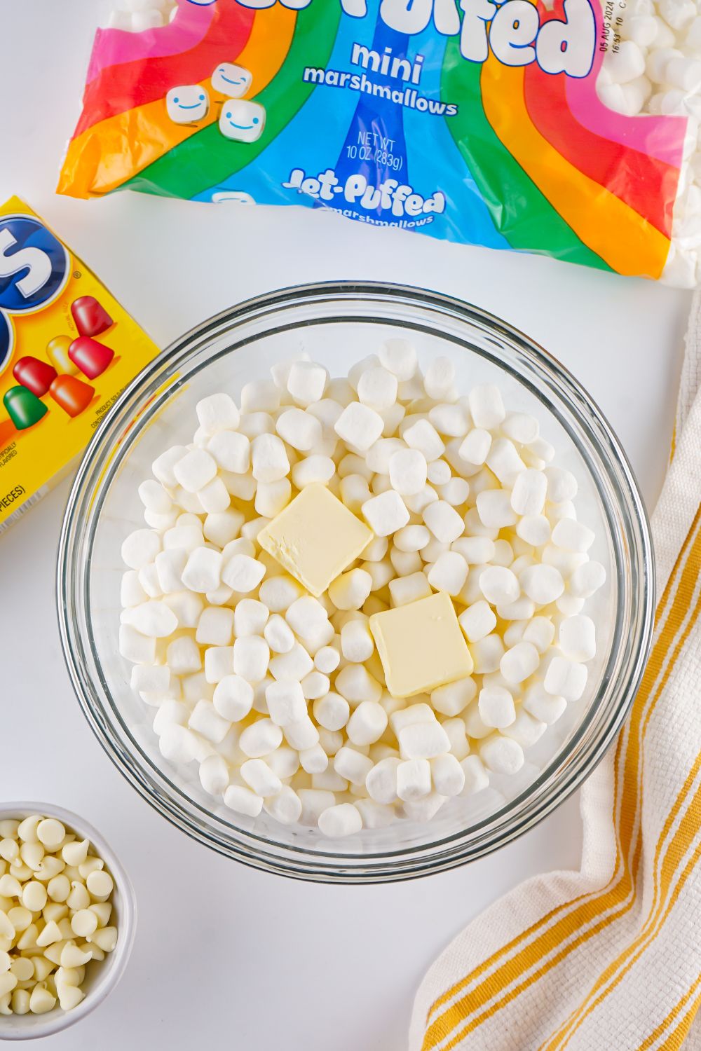 marshmallow and butter in a glass bowl on table 