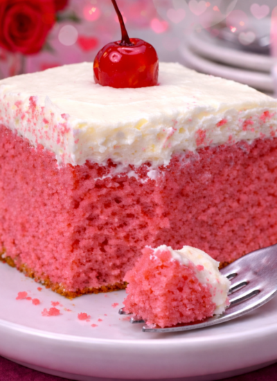 Valentines Day Very Cherry Cake on a white plate with valentines day decor