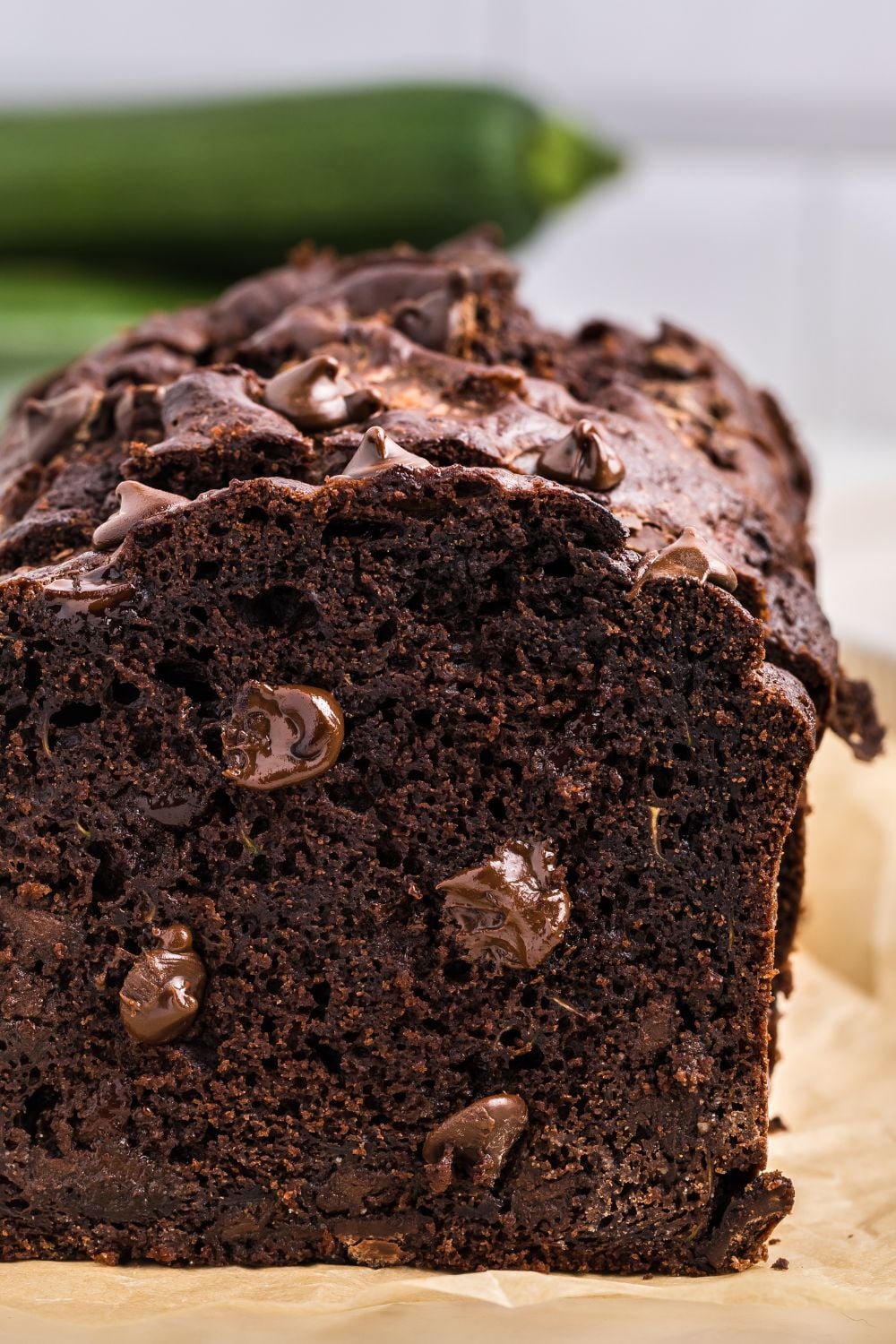 Double Chocolate Zucchini Bread sliced and placed on a wooden table